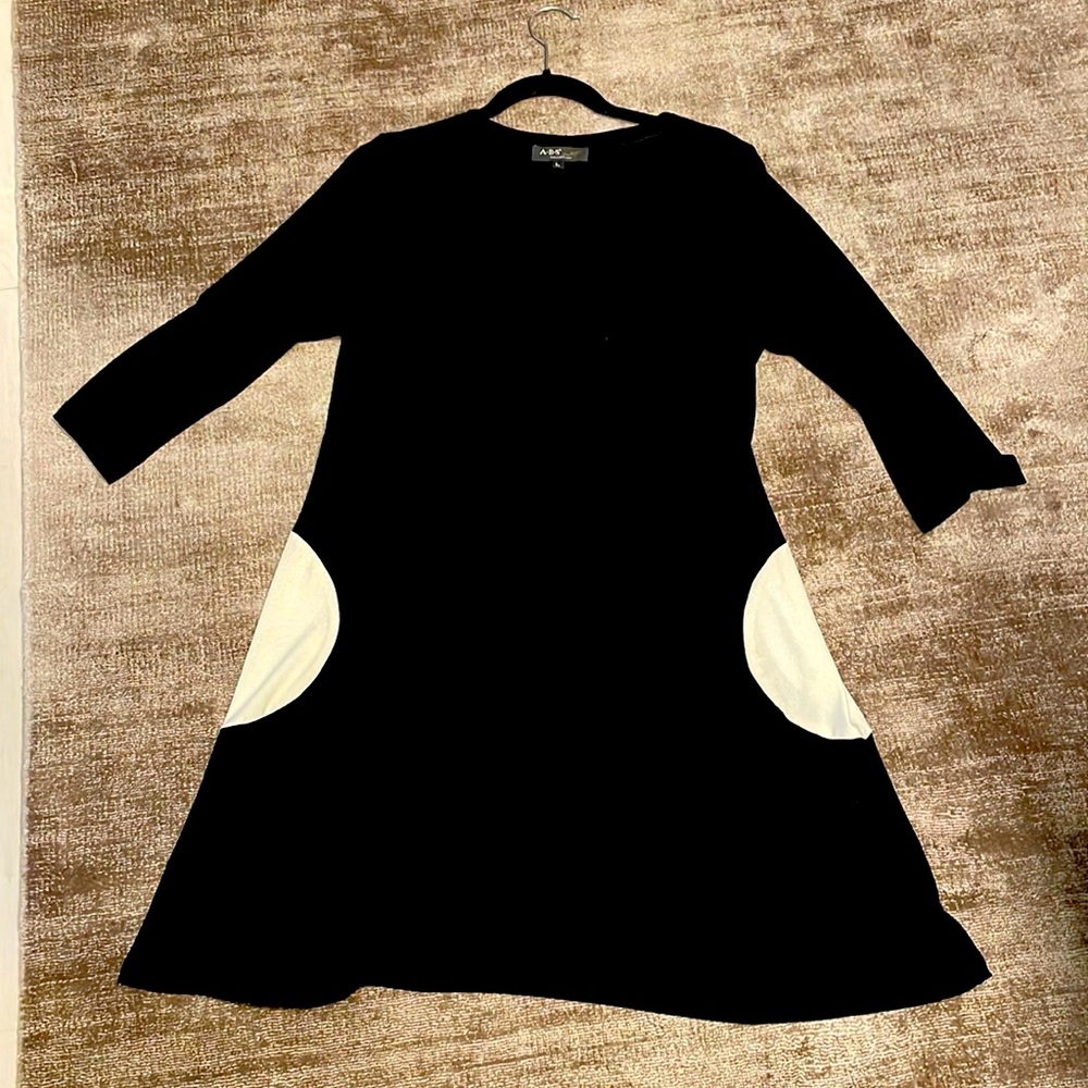 Black 60s inspired dress with white detail